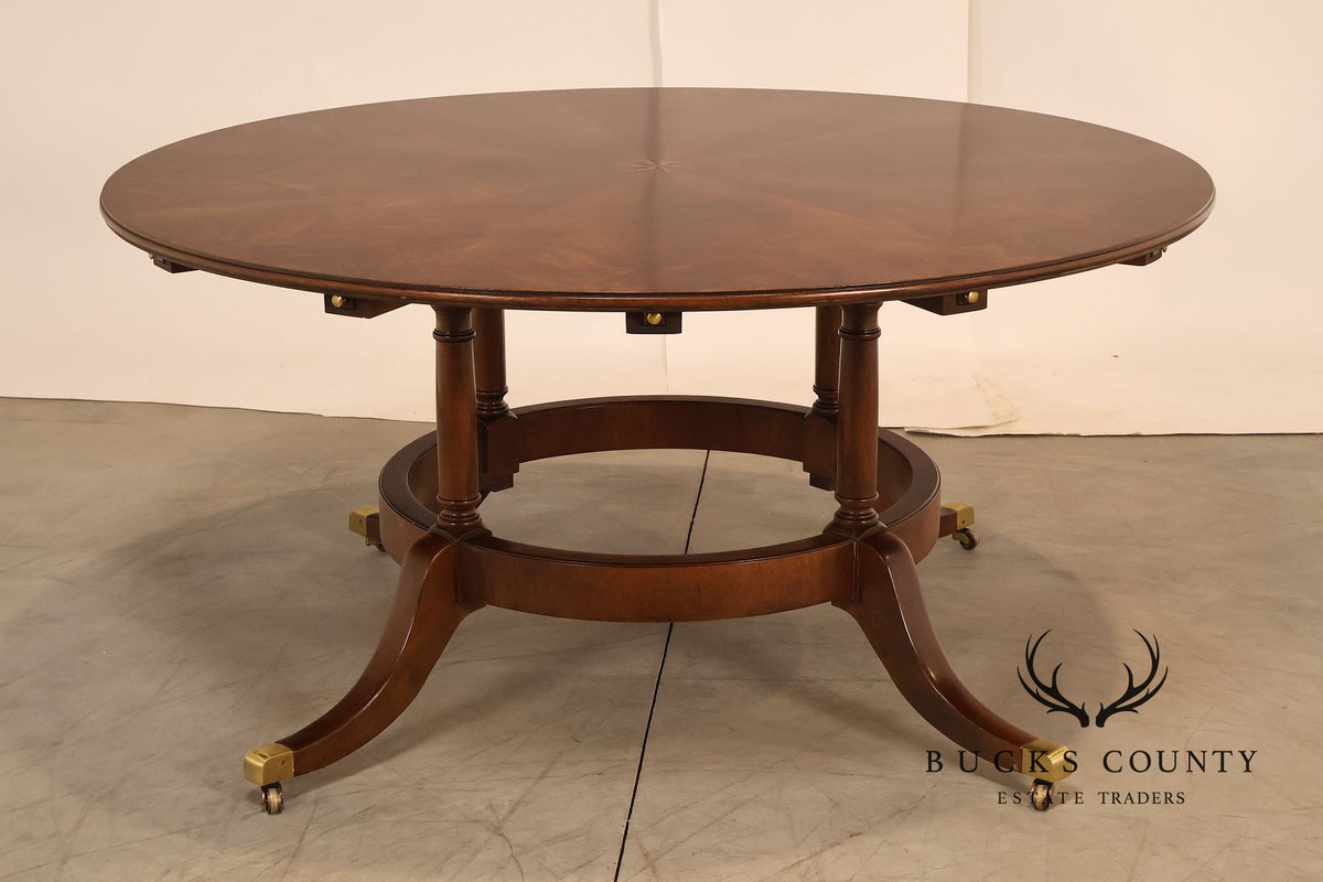 E.J. Victor Regency Style Round Inlaid Mahogany Pedestal Dining Table