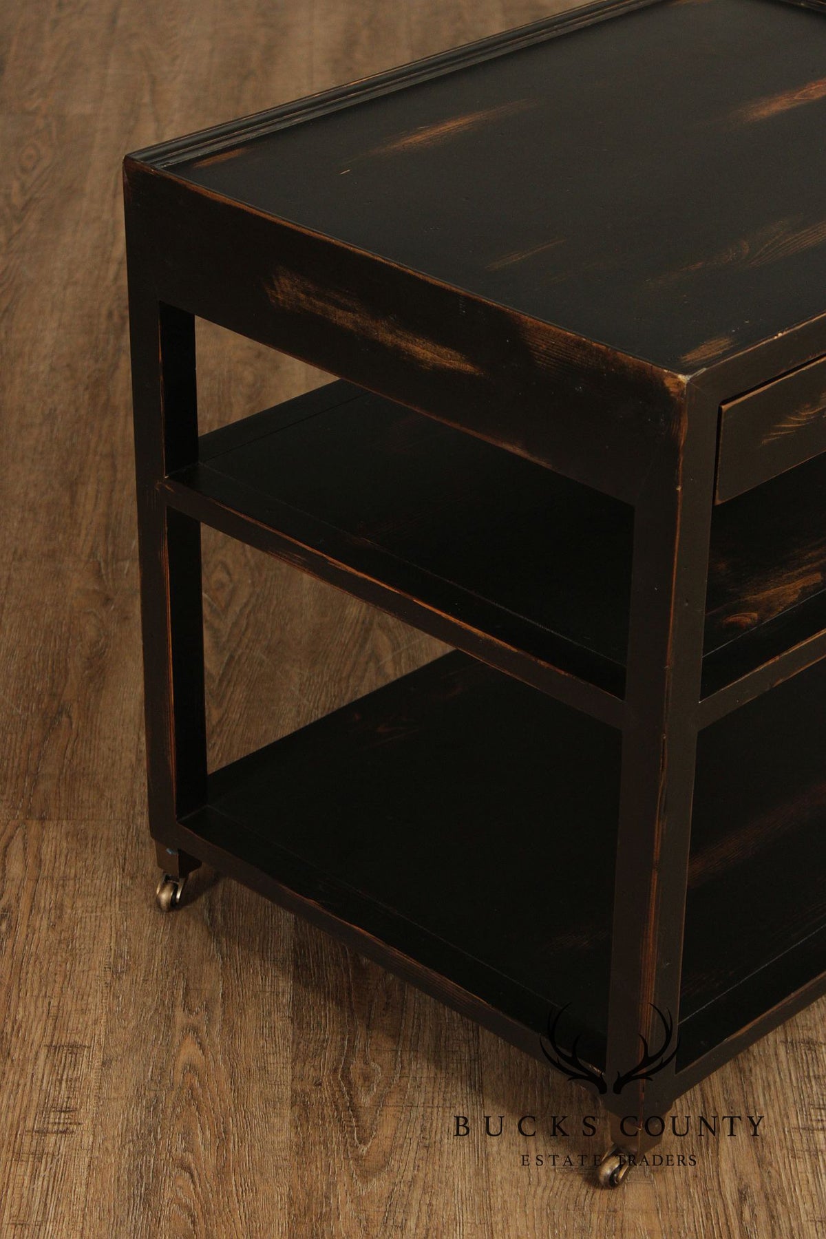 Industrial Style Pair of Ebonized Rolling End Tables