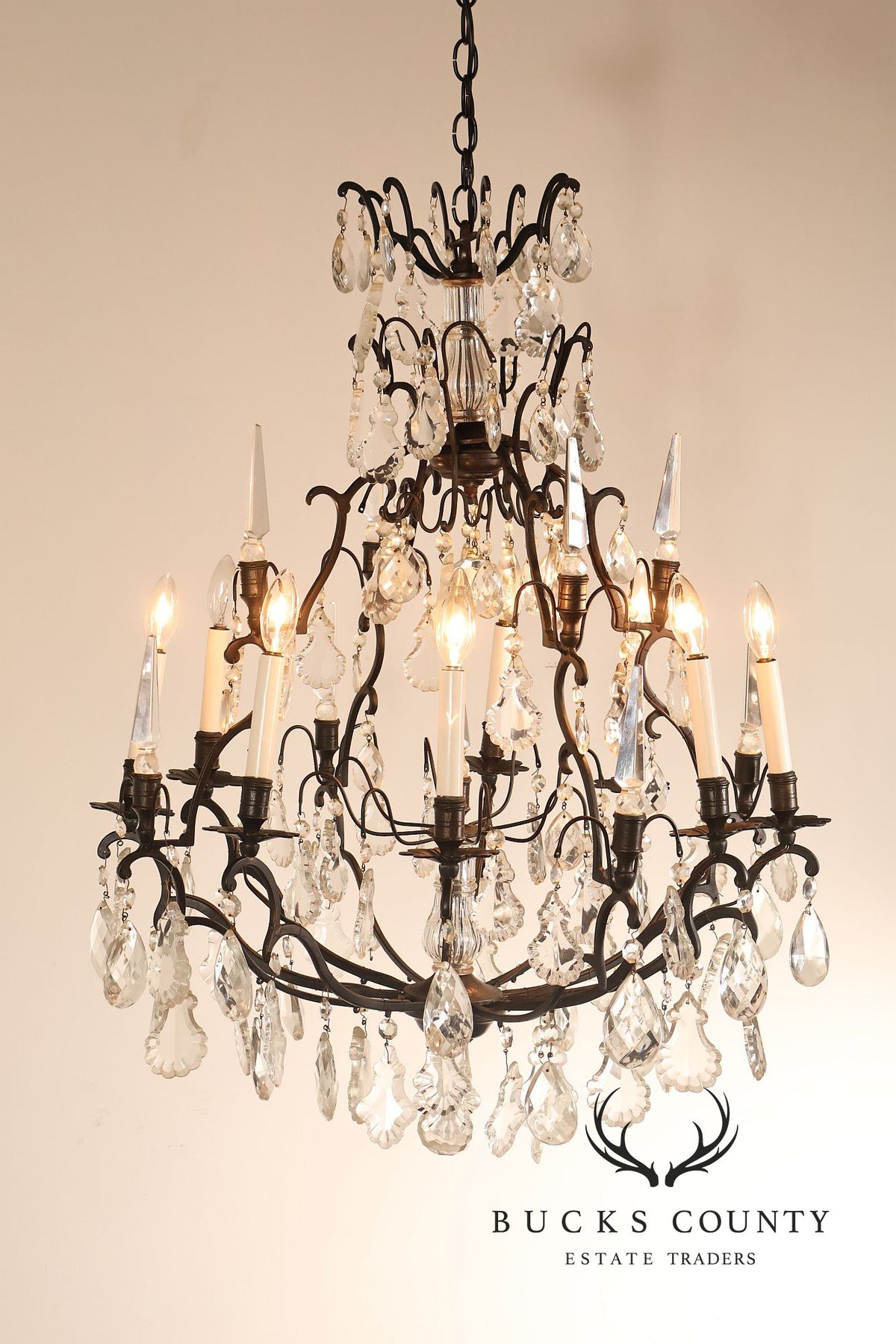 French Louis XV Style Crystal And Wrought Iron Eight Light Chandelier