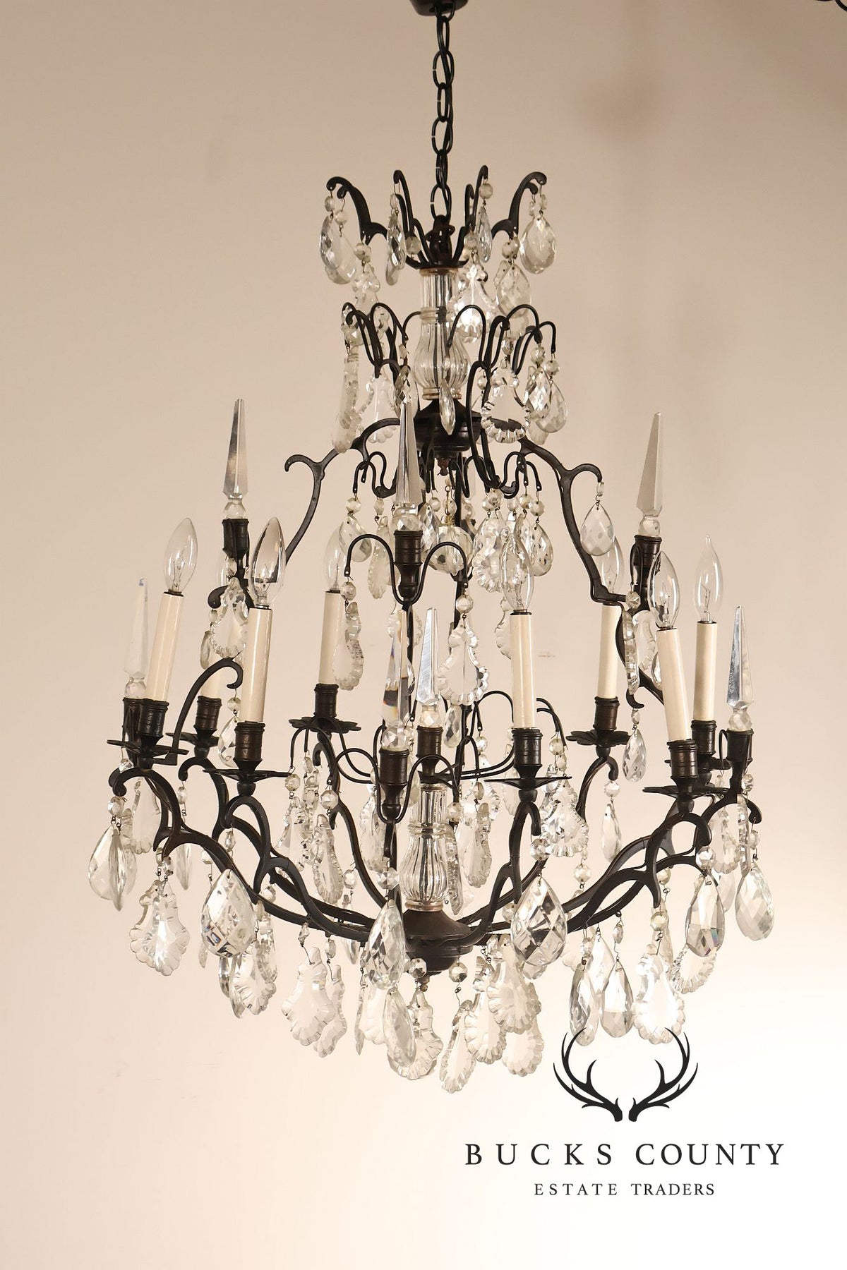 French Louis XV Style Crystal And Wrought Iron Eight Light Chandelier