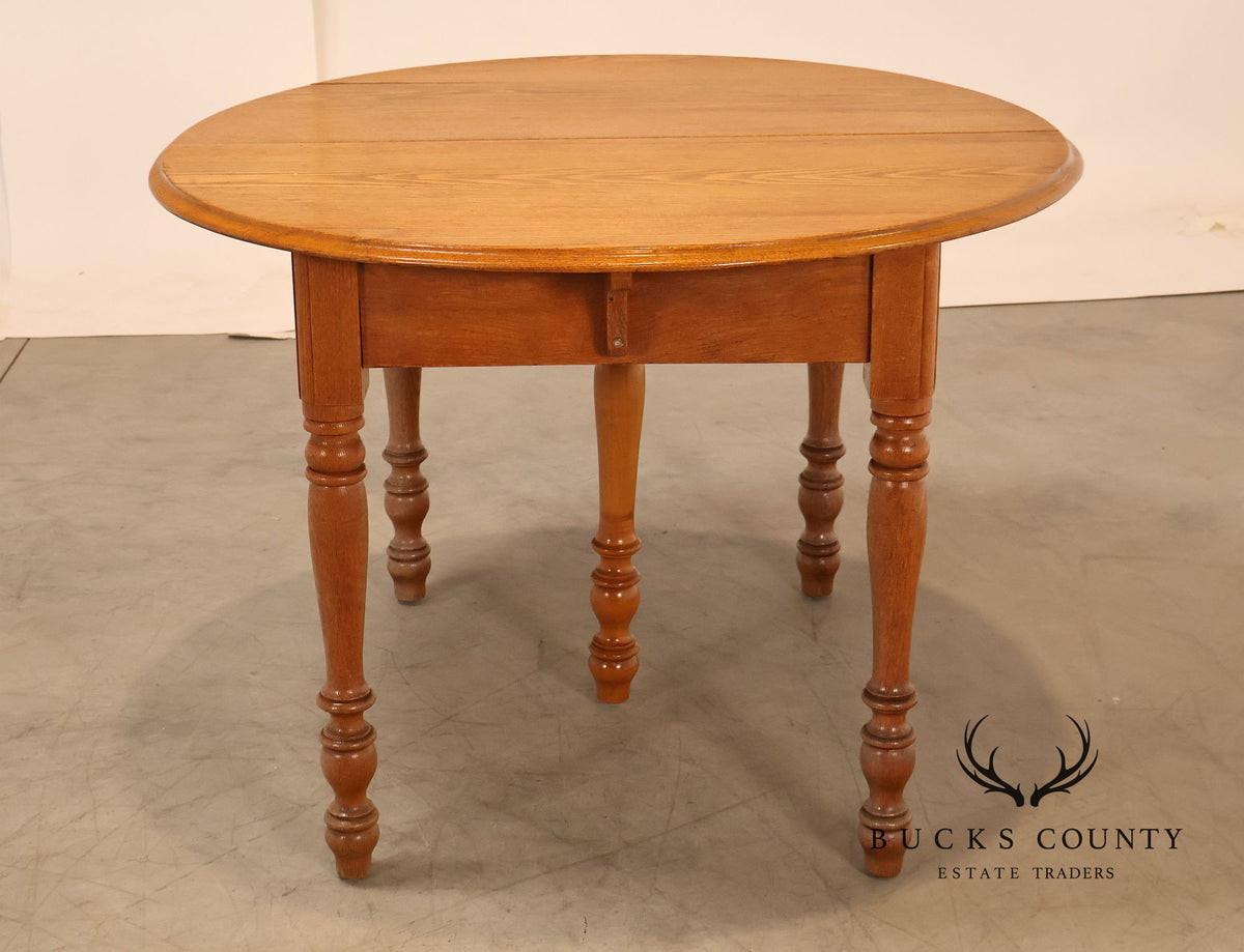 Antique Farmhouse Style Round Oak Extendable Dining Table