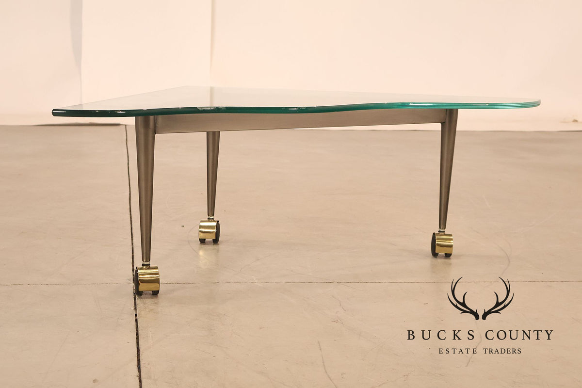 Postmodern Pair Of Triangular Glass Top Coffee Table with Brushed Steel Frame and Brass Casters