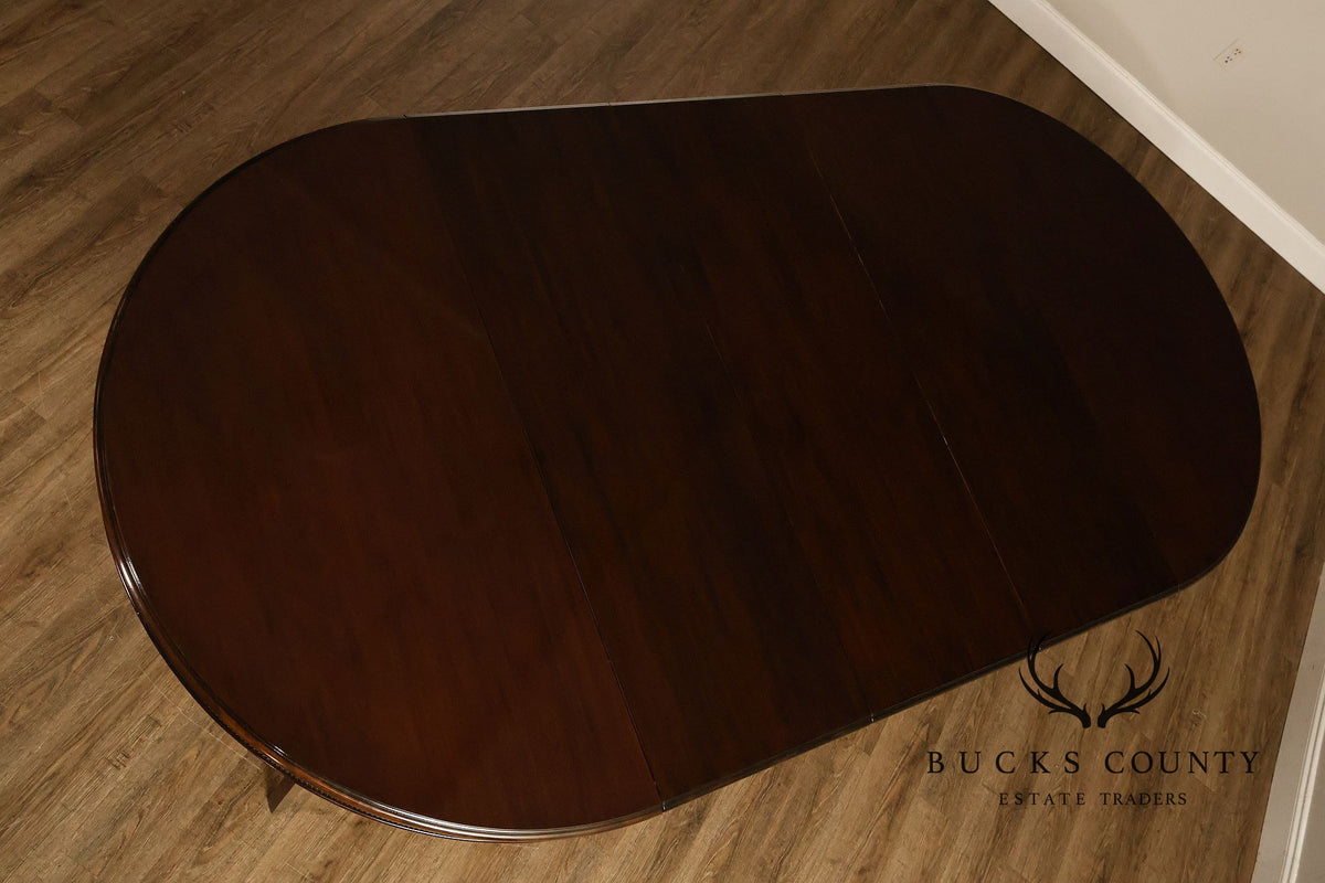 Empire Style 54" Round Mahogany Expandable Pedestal Dining Table
