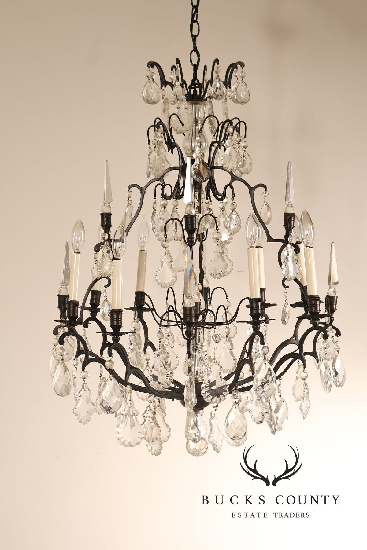 French Louis XV Style Crystal And Wrought Iron Eight Light Chandelier
