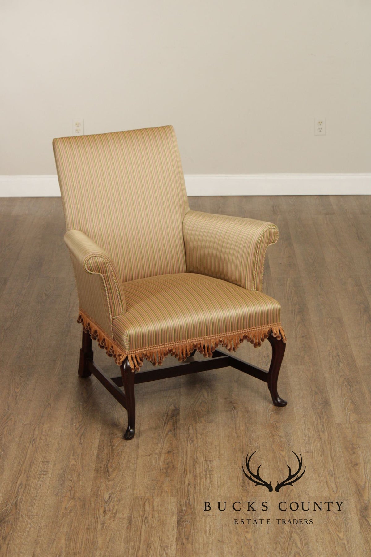 Queen Anne Style Upholstered Armchair With Striped Fabric And Fringe Skirt