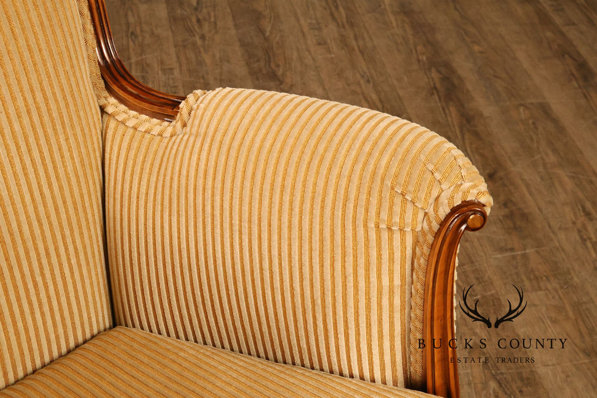 Medea Furniture Pair of Louis XVI Style Carved Bergere Armchairs With Gold Striped Velvet Upholstery
