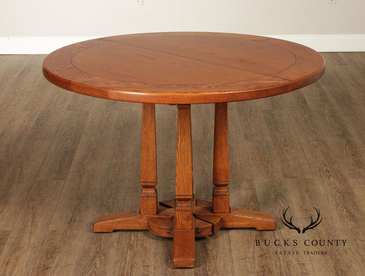 Romweber Round Viking Oak Expandable Dining Table With Four Leaves
