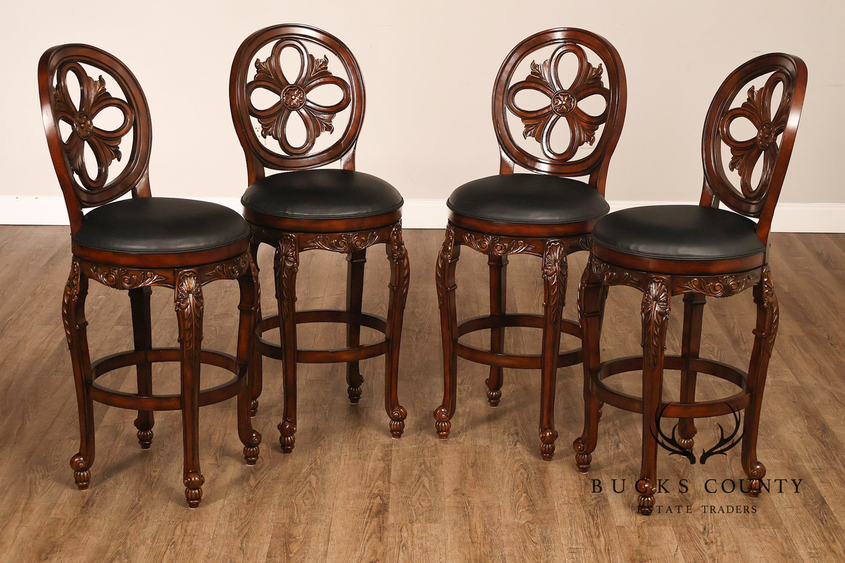 Quality Set Of Four Carved Mahogany Swivel Bar Stools