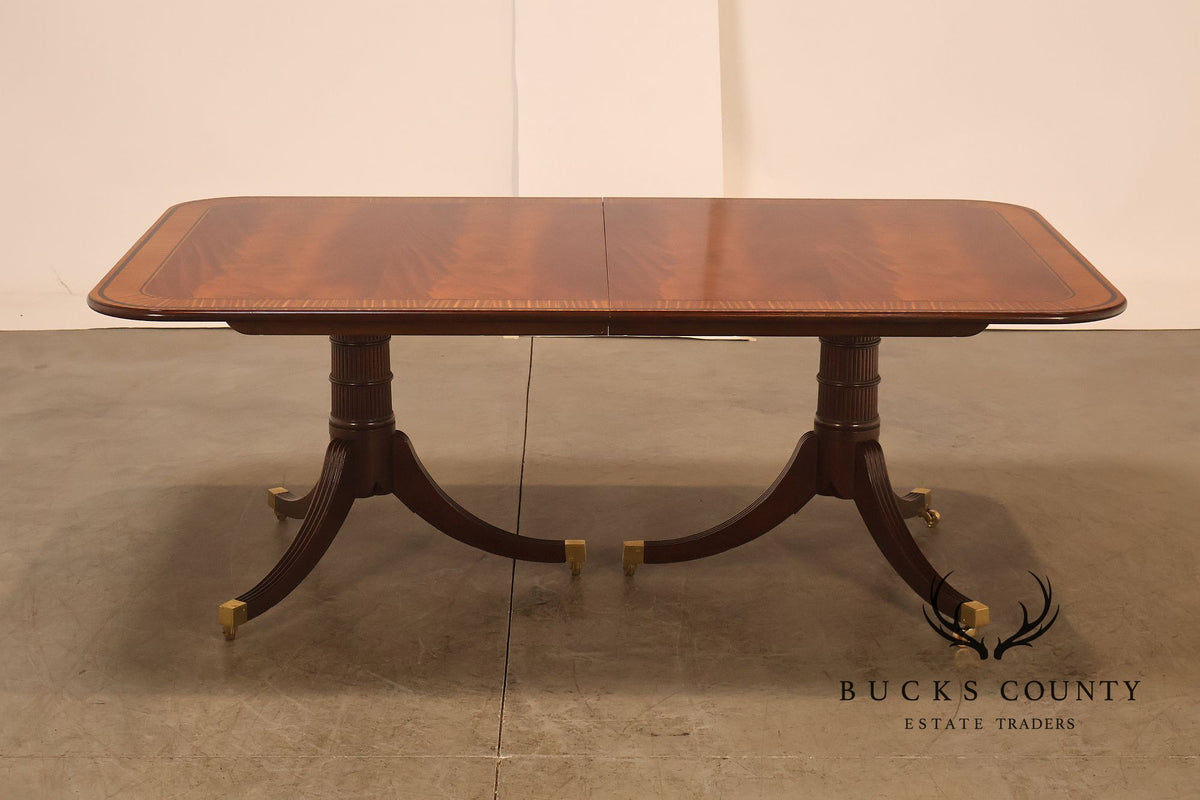 Baker Furniture Mahogany Banded Double Pedestal Extension Dining Table With Three Leaves