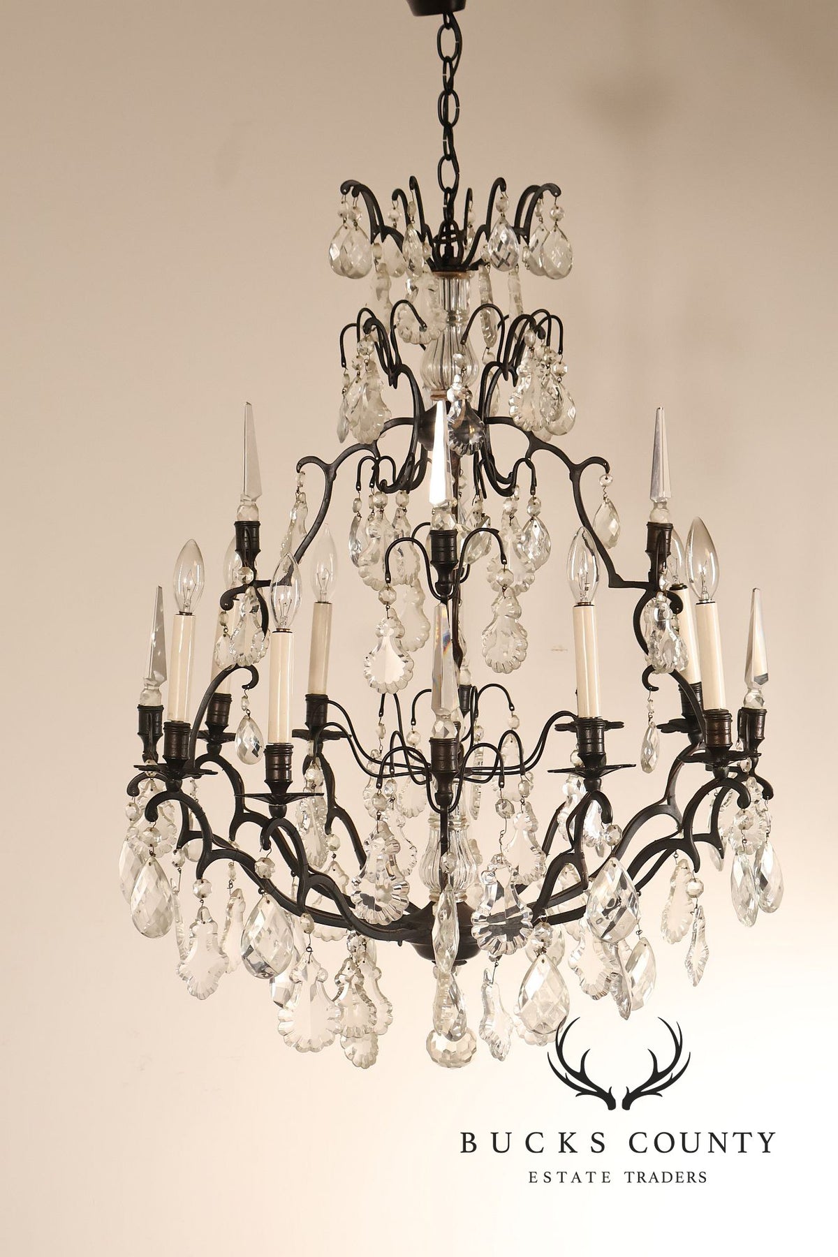 French Louis XV Style Crystal And Wrought Iron Eight Light Chandelier