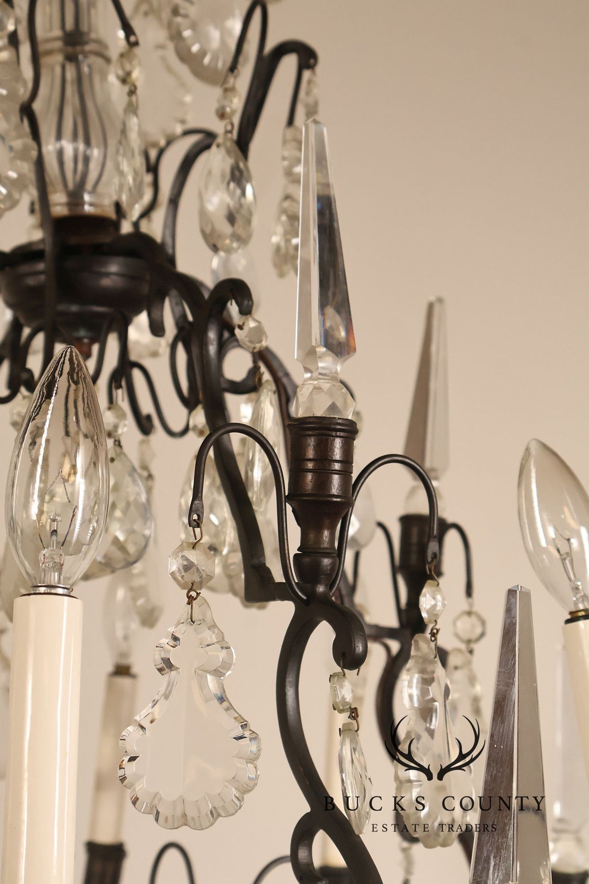 French Louis XV Style Crystal And Wrought Iron Eight Light Chandelier