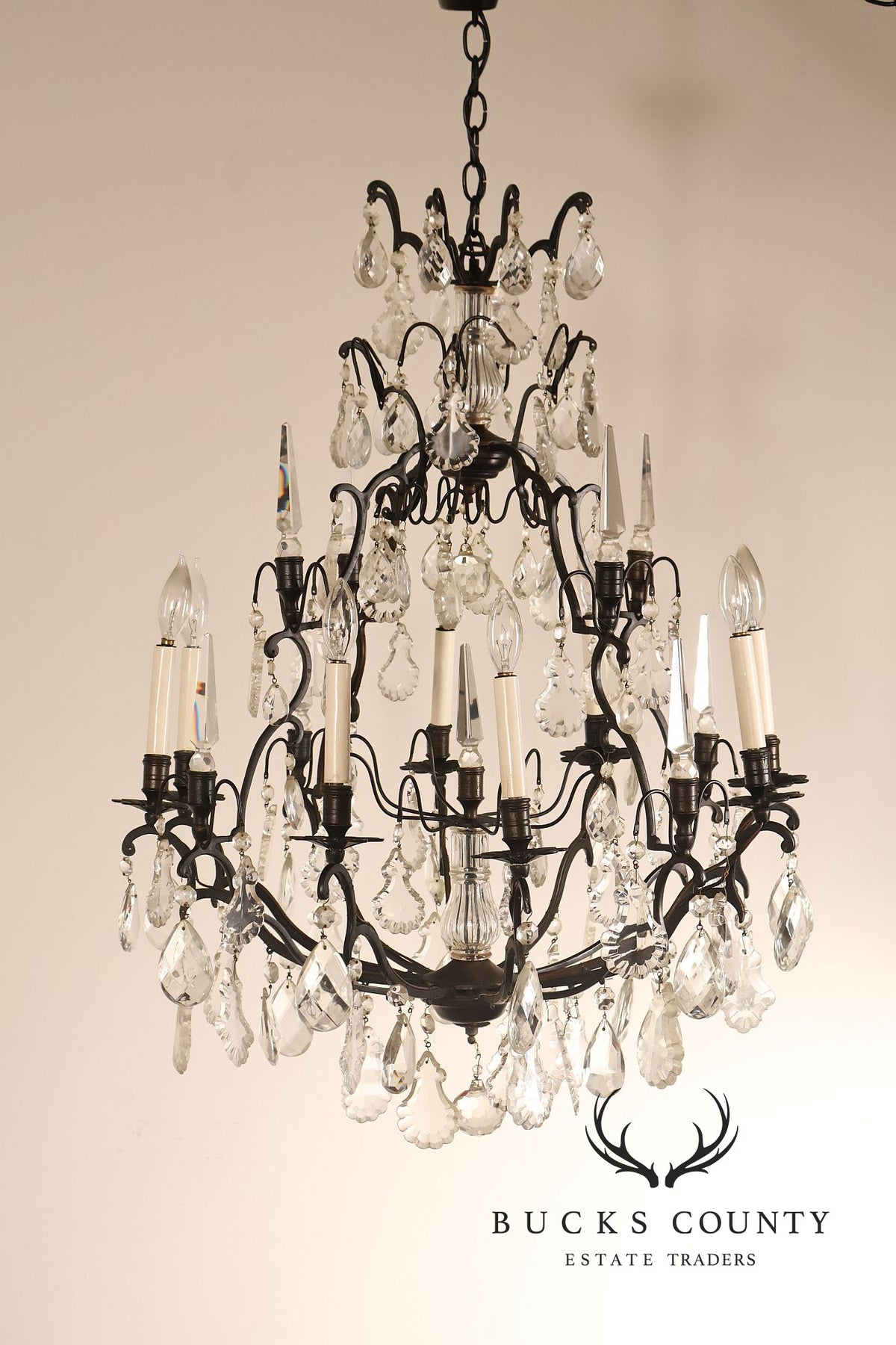French Louis XV Style Crystal And Wrought Iron Eight Light Chandelier