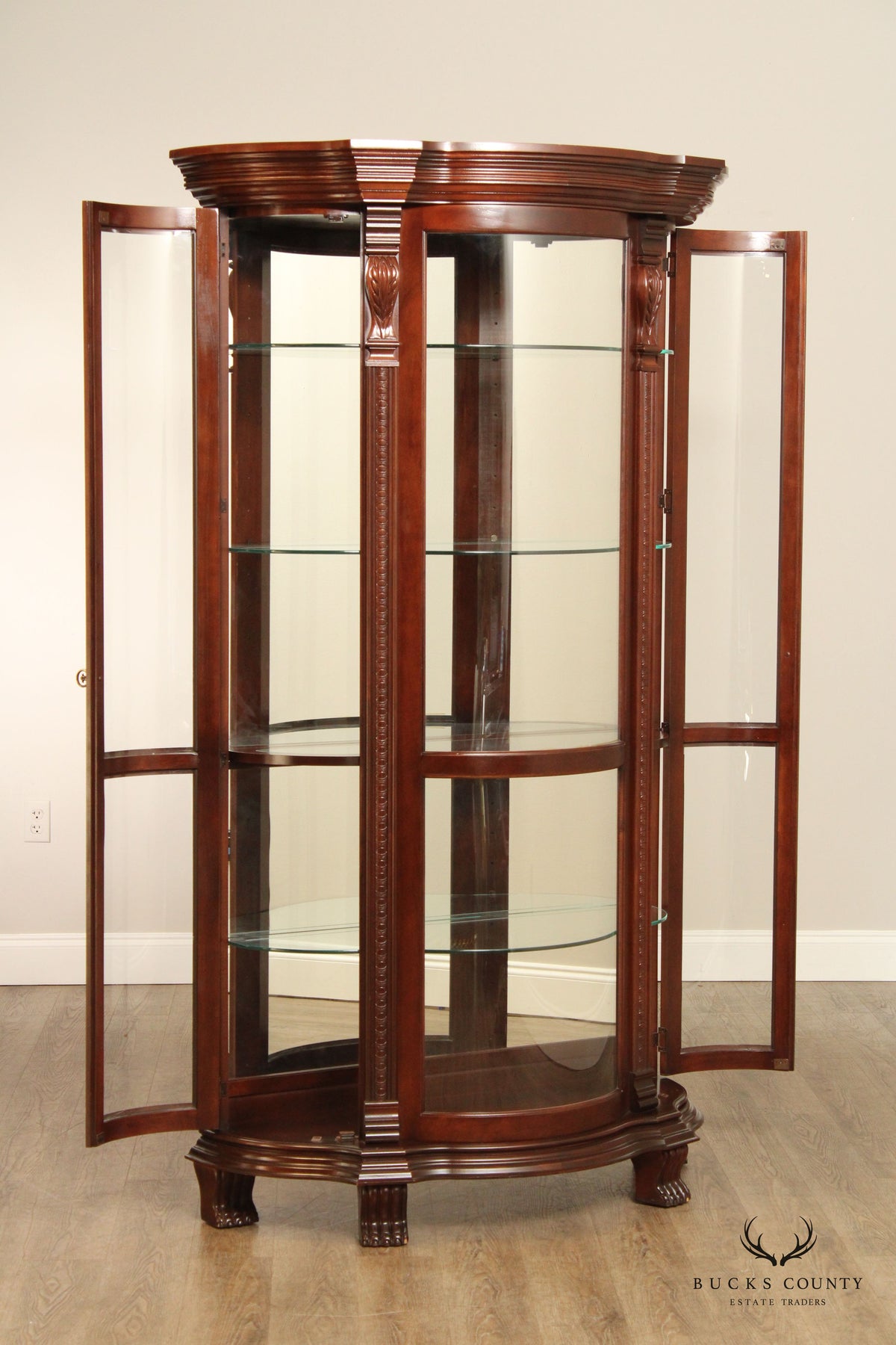 Philip Reinisch Company Bow Front Illuminated Curio Cabinet