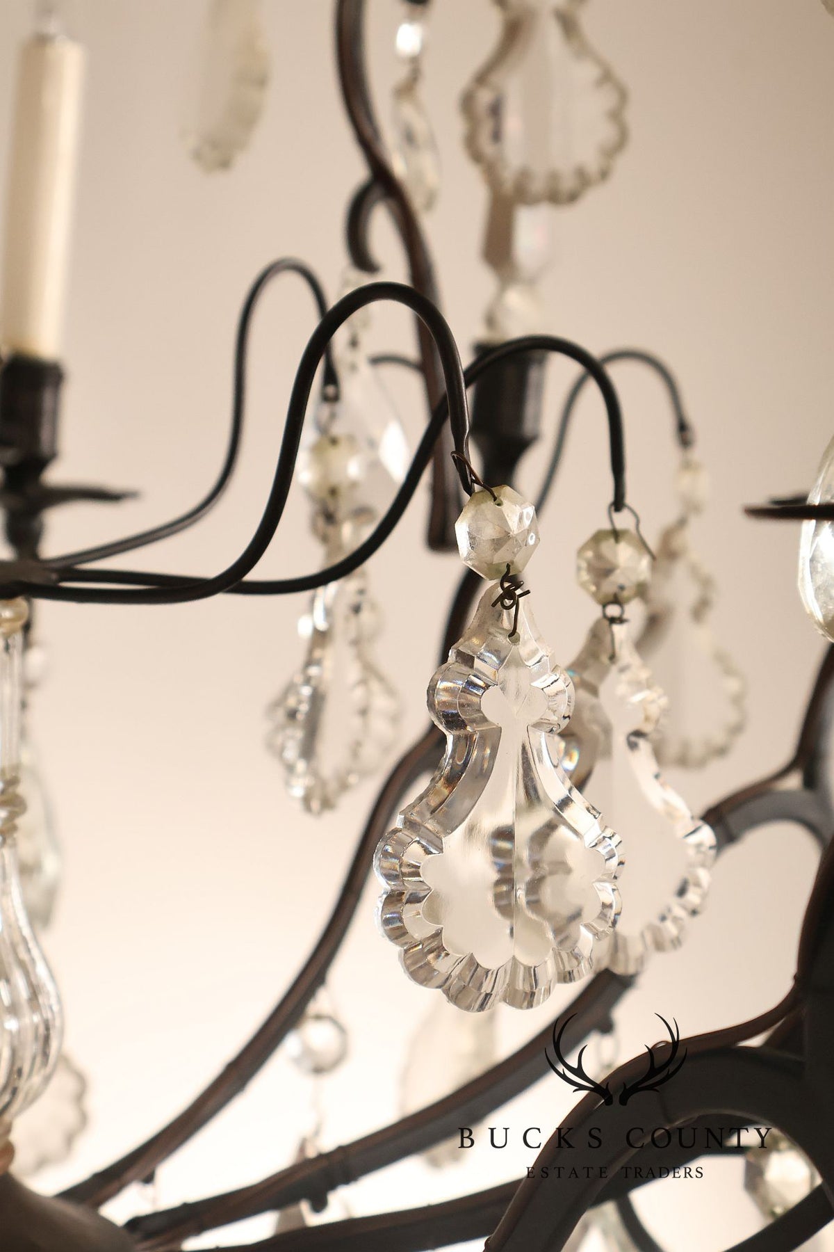 French Louis XV Style Crystal And Wrought Iron Eight Light Chandelier