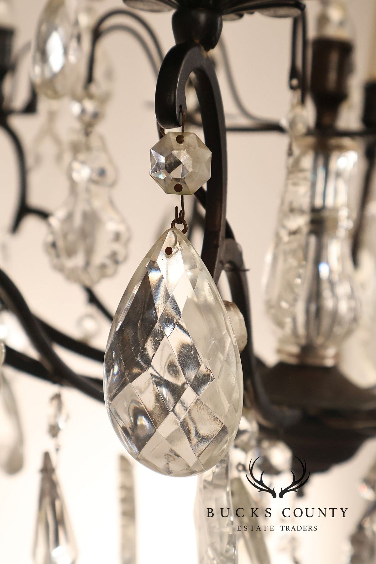 French Louis XV Style Crystal And Wrought Iron Eight Light Chandelier