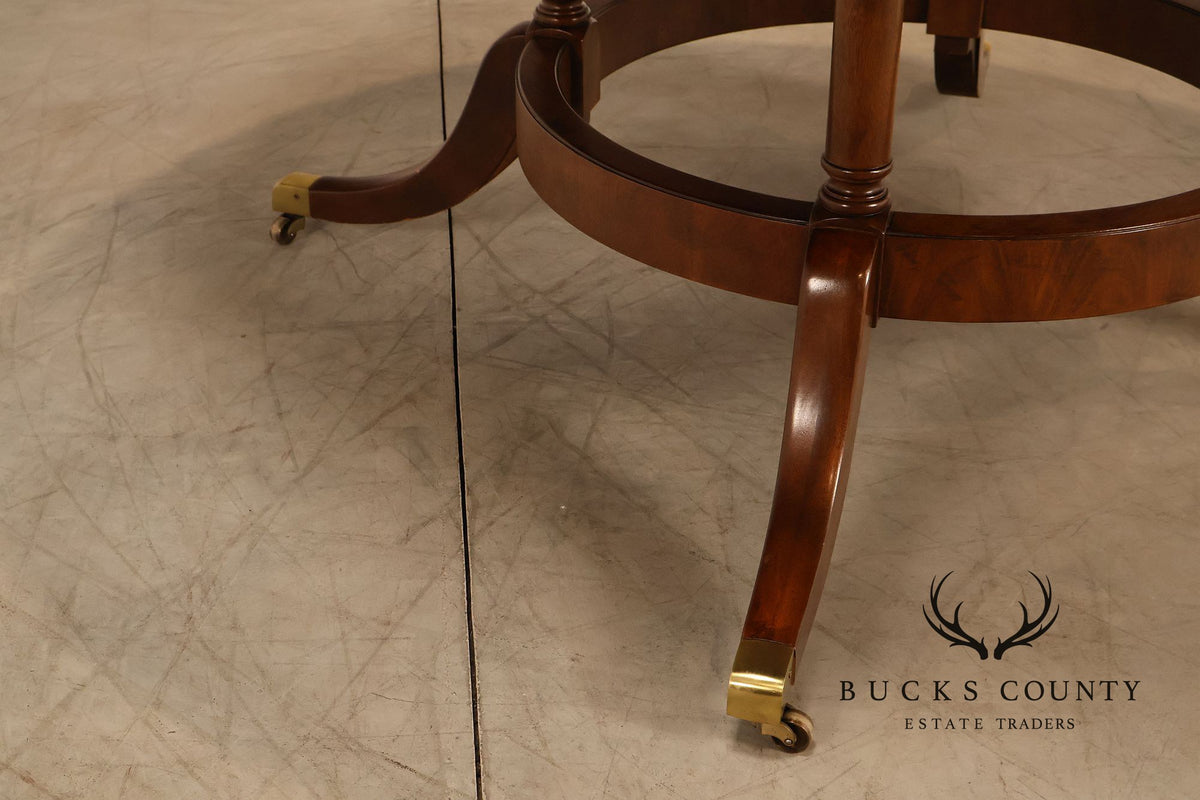 E.J. Victor Regency Style Round Inlaid Mahogany Pedestal Dining Table