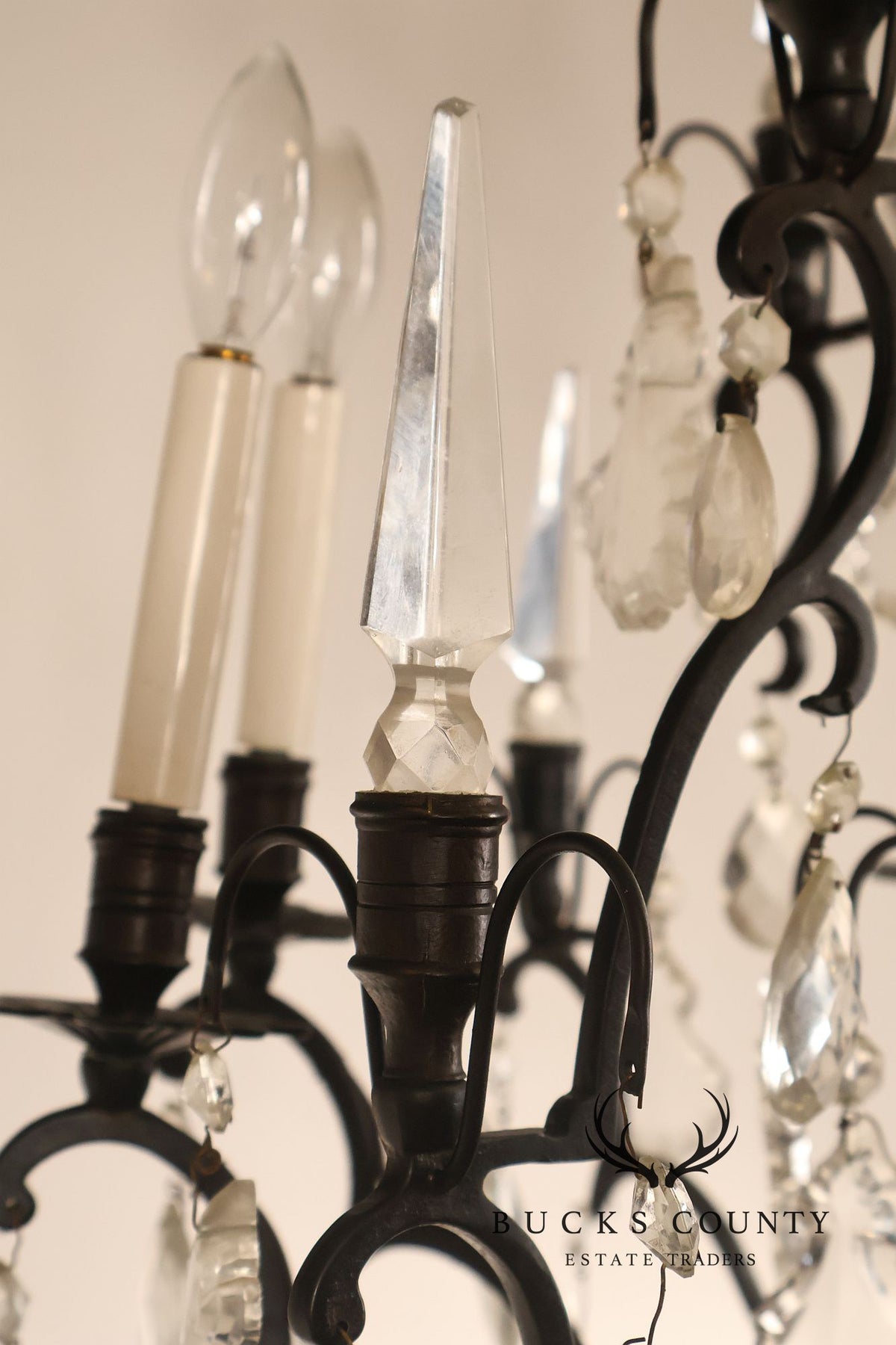 French Louis XV Style Crystal And Wrought Iron Eight Light Chandelier