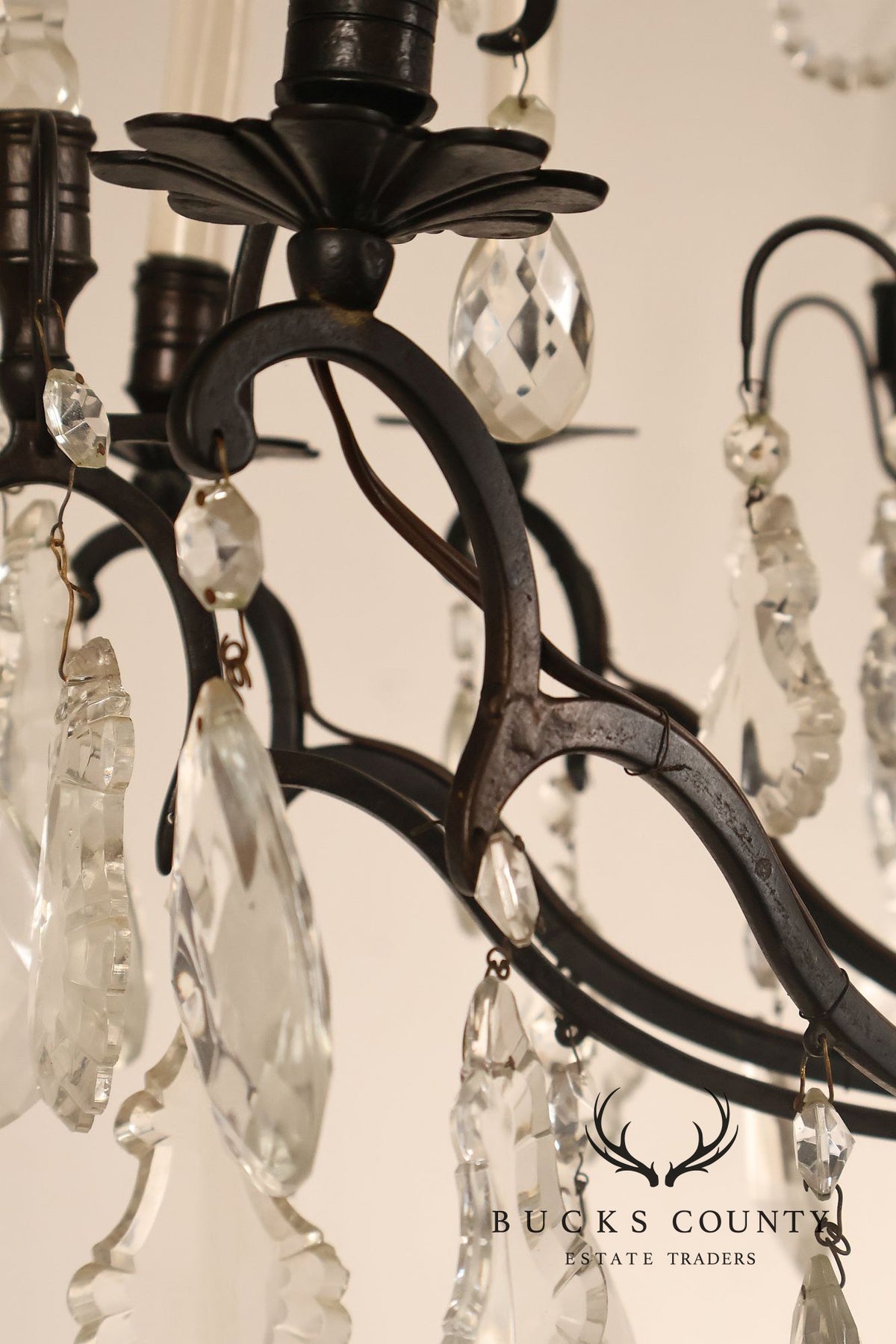 French Louis XV Style Crystal And Wrought Iron Eight Light Chandelier