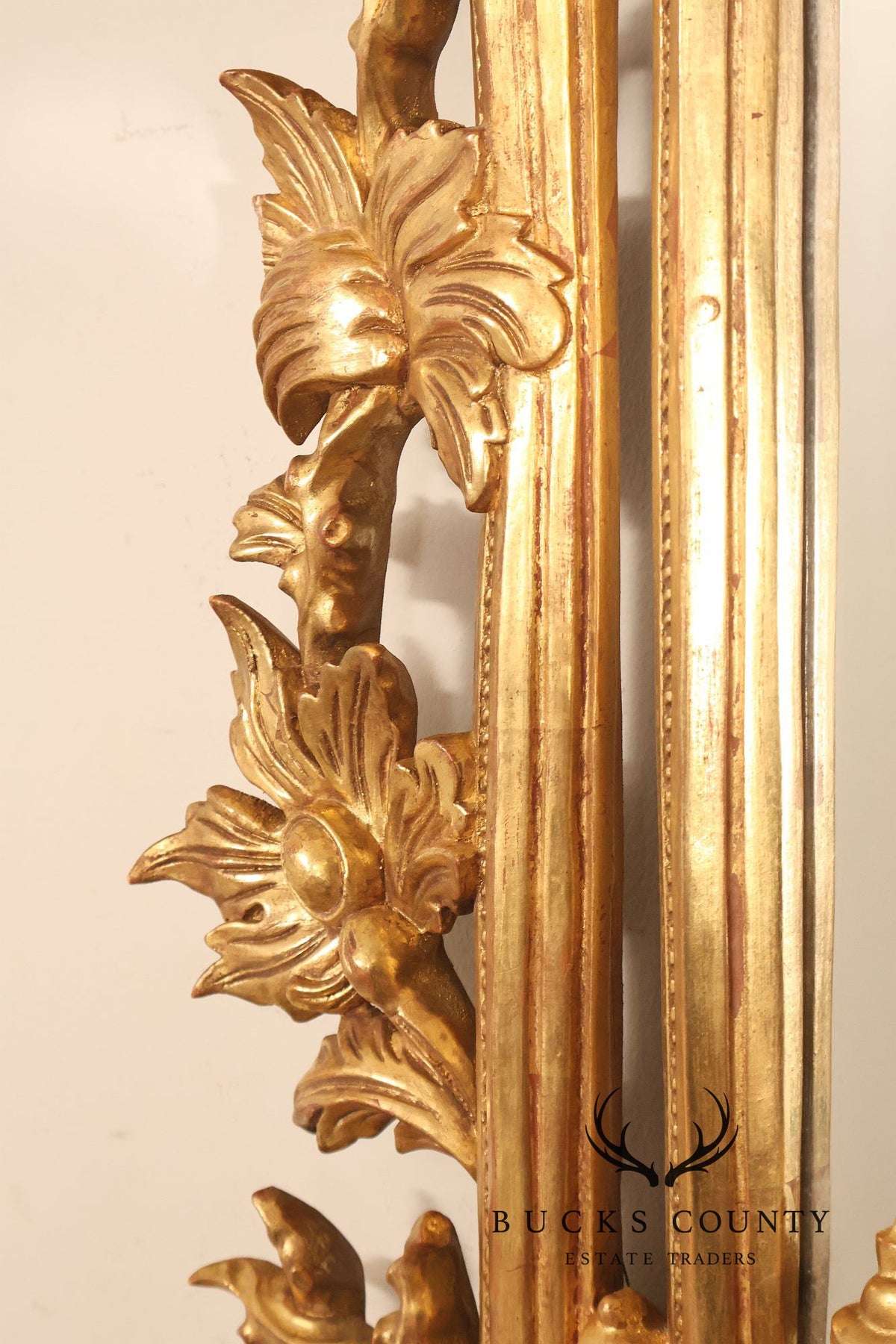 Italian Giltwood Rococo Style Wall Mirror with Floral Carved Frame