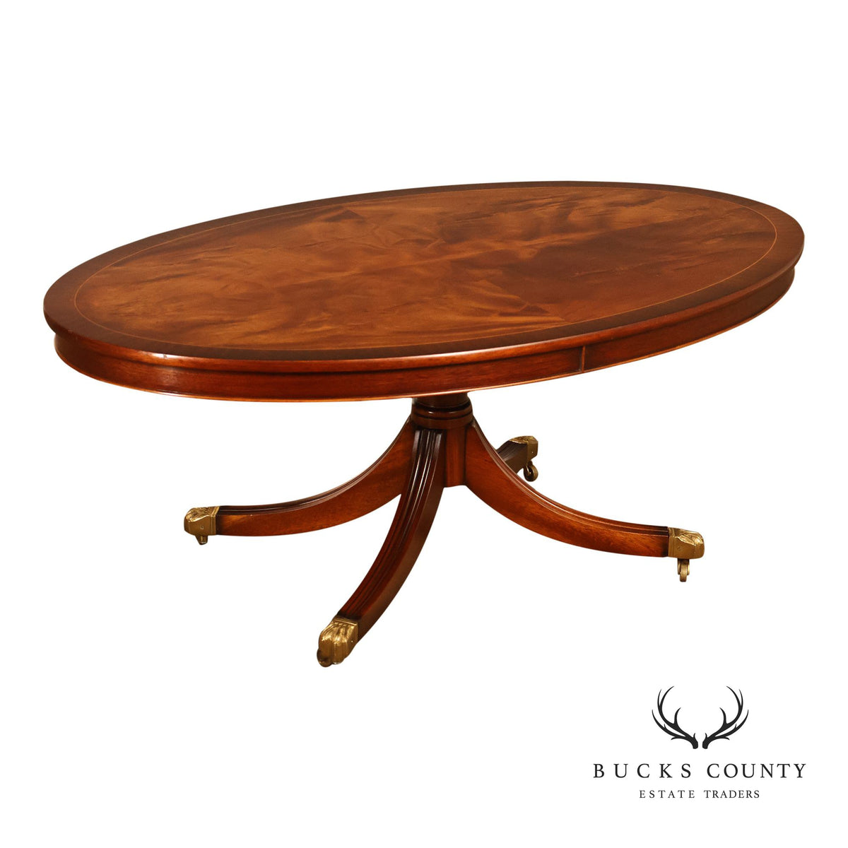 Regency Style Flame Mahogany Oval Top Coffee Table