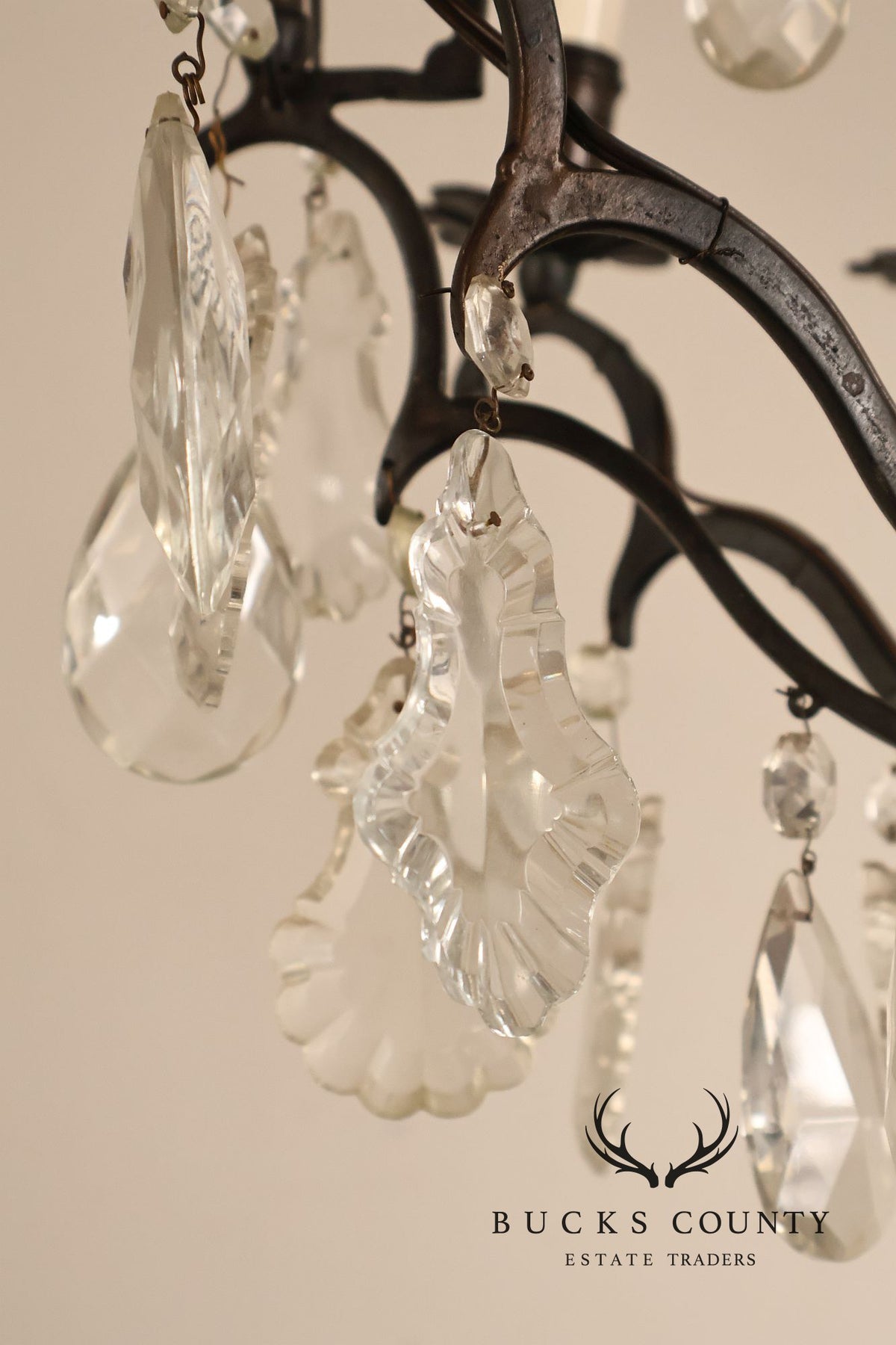 French Louis XV Style Crystal And Wrought Iron Eight Light Chandelier