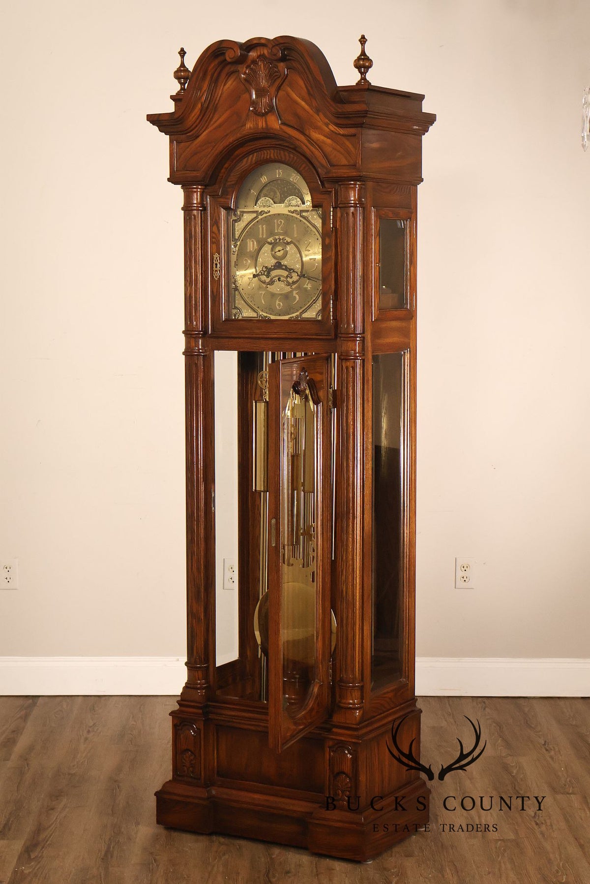 Sligh Traditional Oak Triple Chime Grandfather Clock With Moon Phase Dial