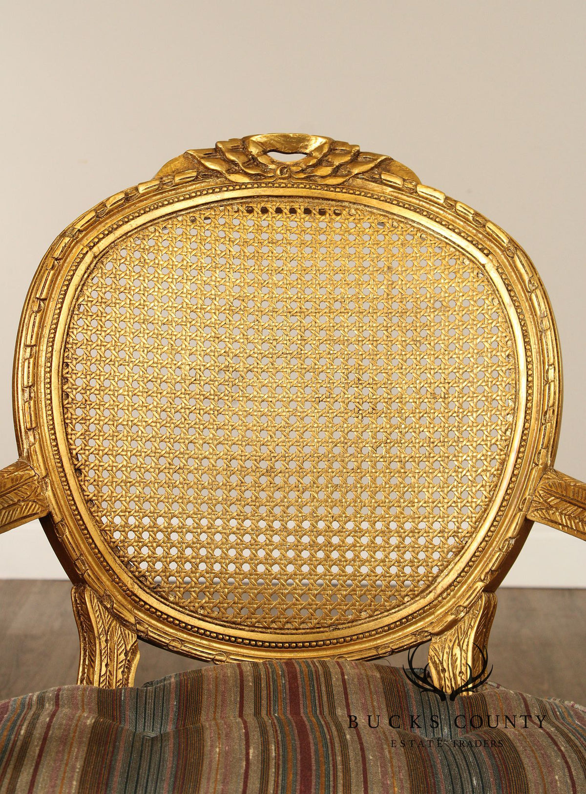 Decorative Crafts, Inc. Pair of French Louis XVI Style Caned Giltwood Fauteuil Armchairs