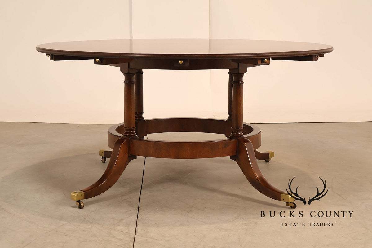 E.J. Victor Regency Style Round Inlaid Mahogany Pedestal Dining Table