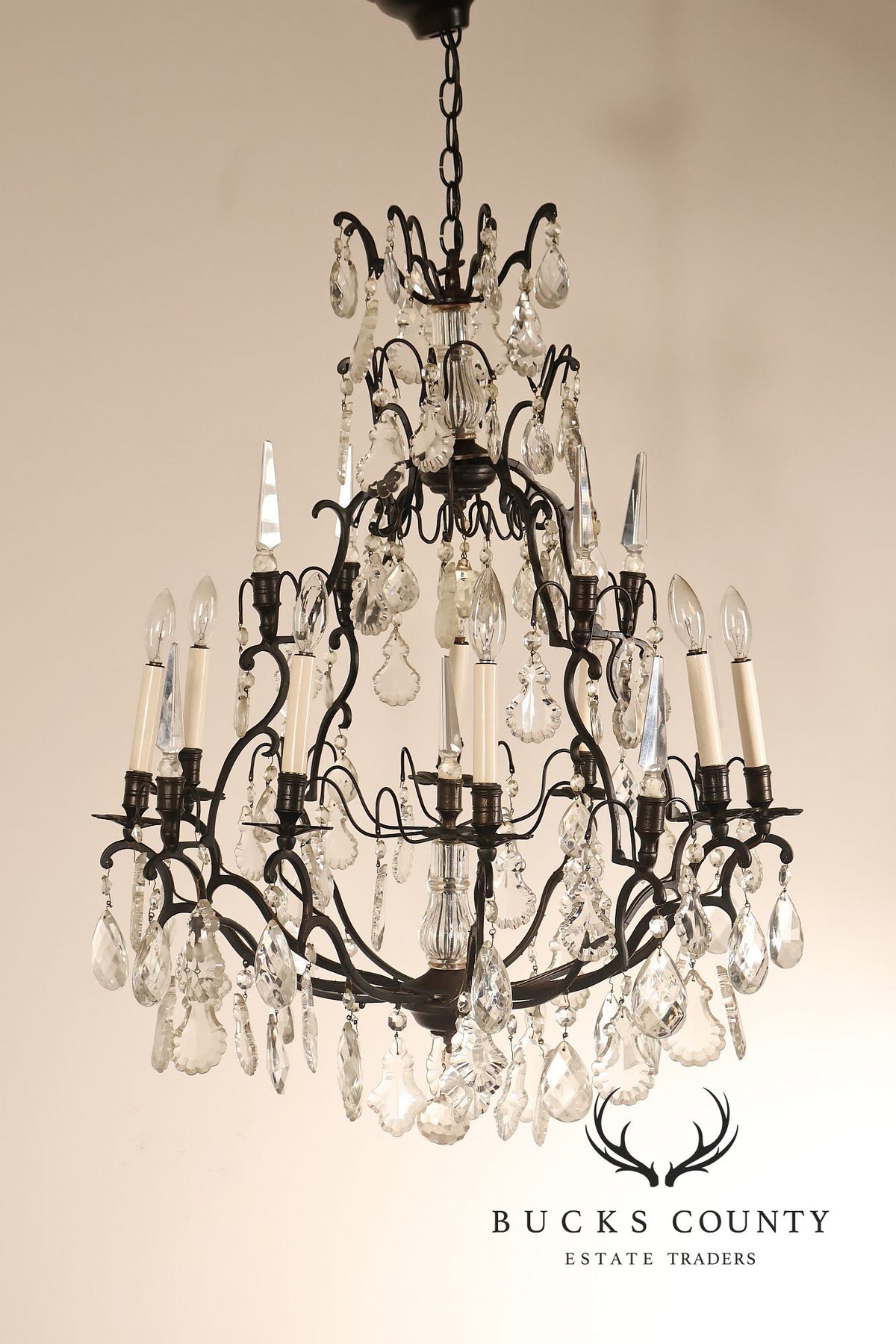 French Louis XV Style Crystal And Wrought Iron Eight Light Chandelier