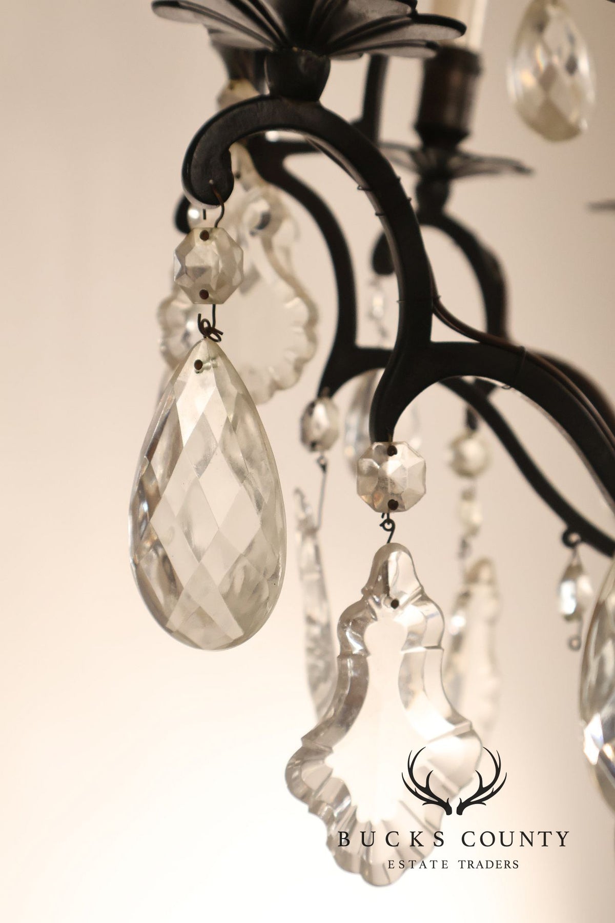 French Louis XV Style Crystal And Wrought Iron Eight Light Chandelier