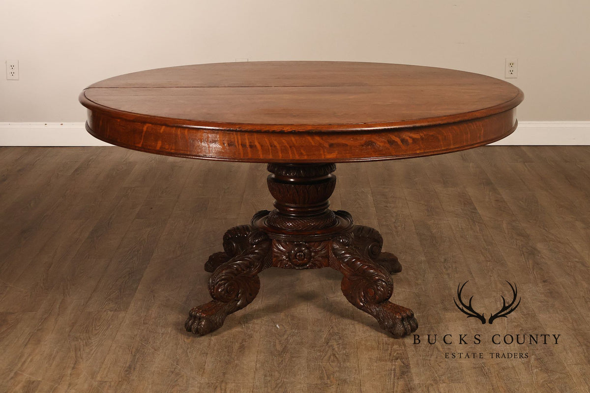 Antique 57 inch Round Oak Pedestal Dining Table With Carved Claw Feet
