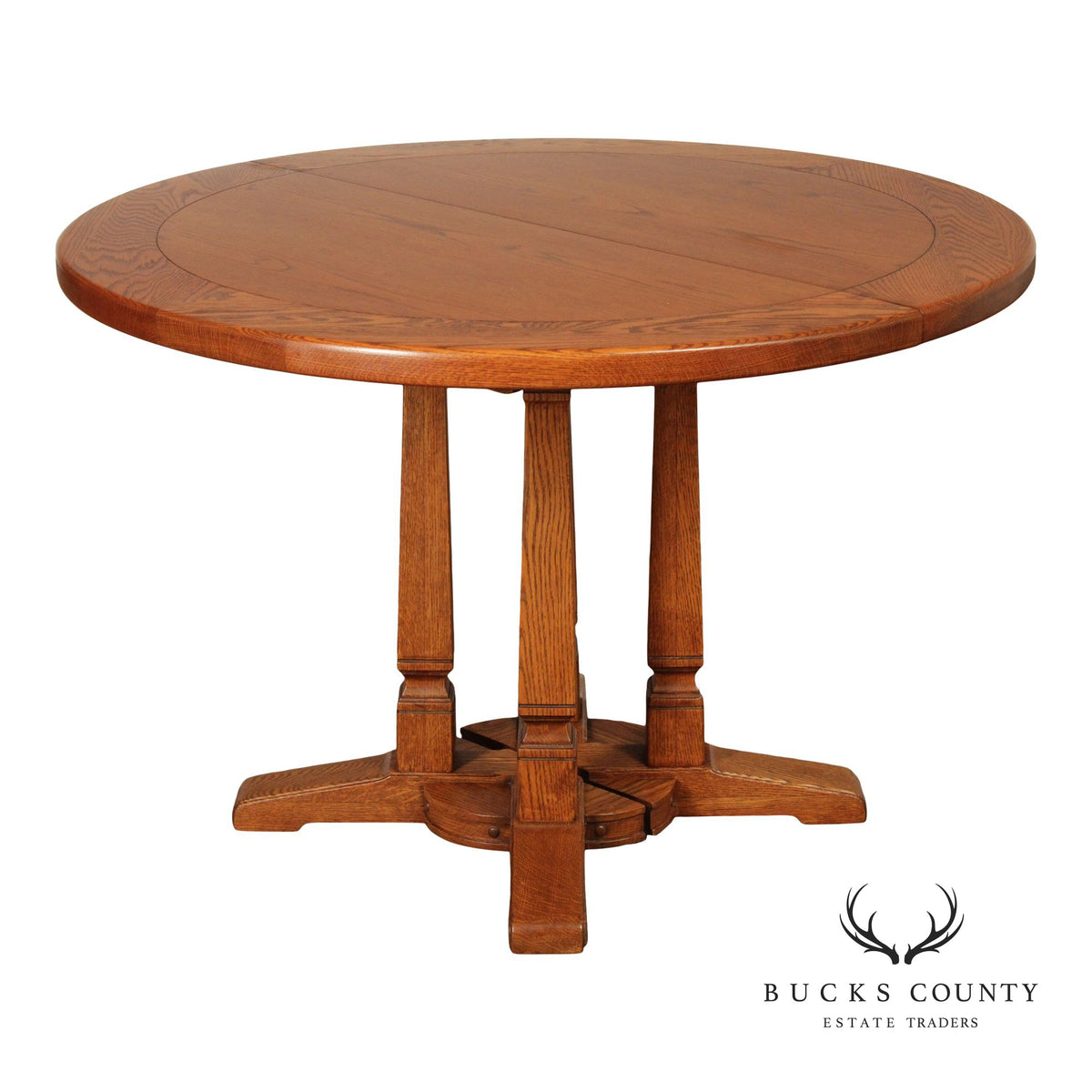 Romweber Round Viking Oak Expandable Dining Table With Four Leaves