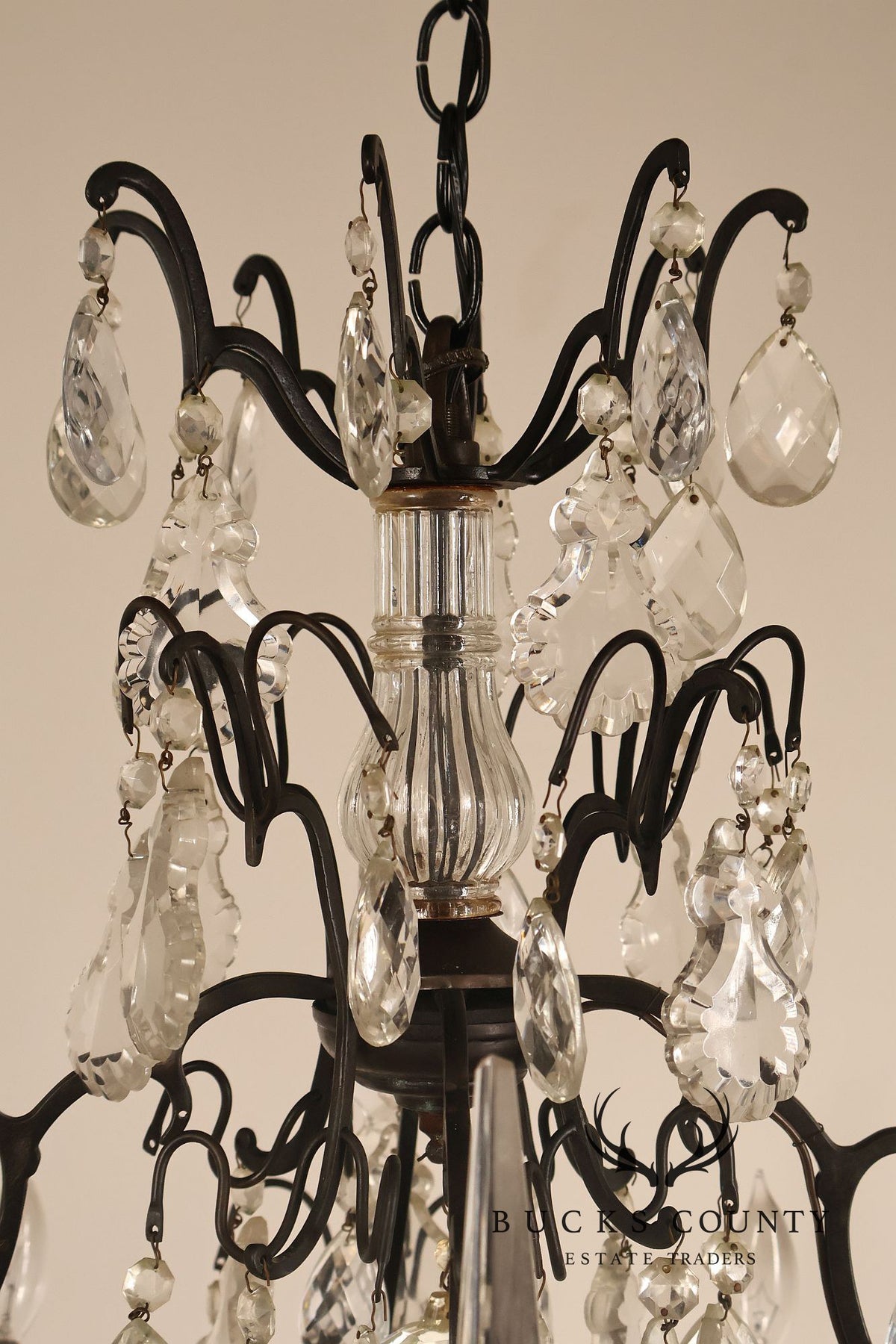 French Louis XV Style Crystal And Wrought Iron Eight Light Chandelier