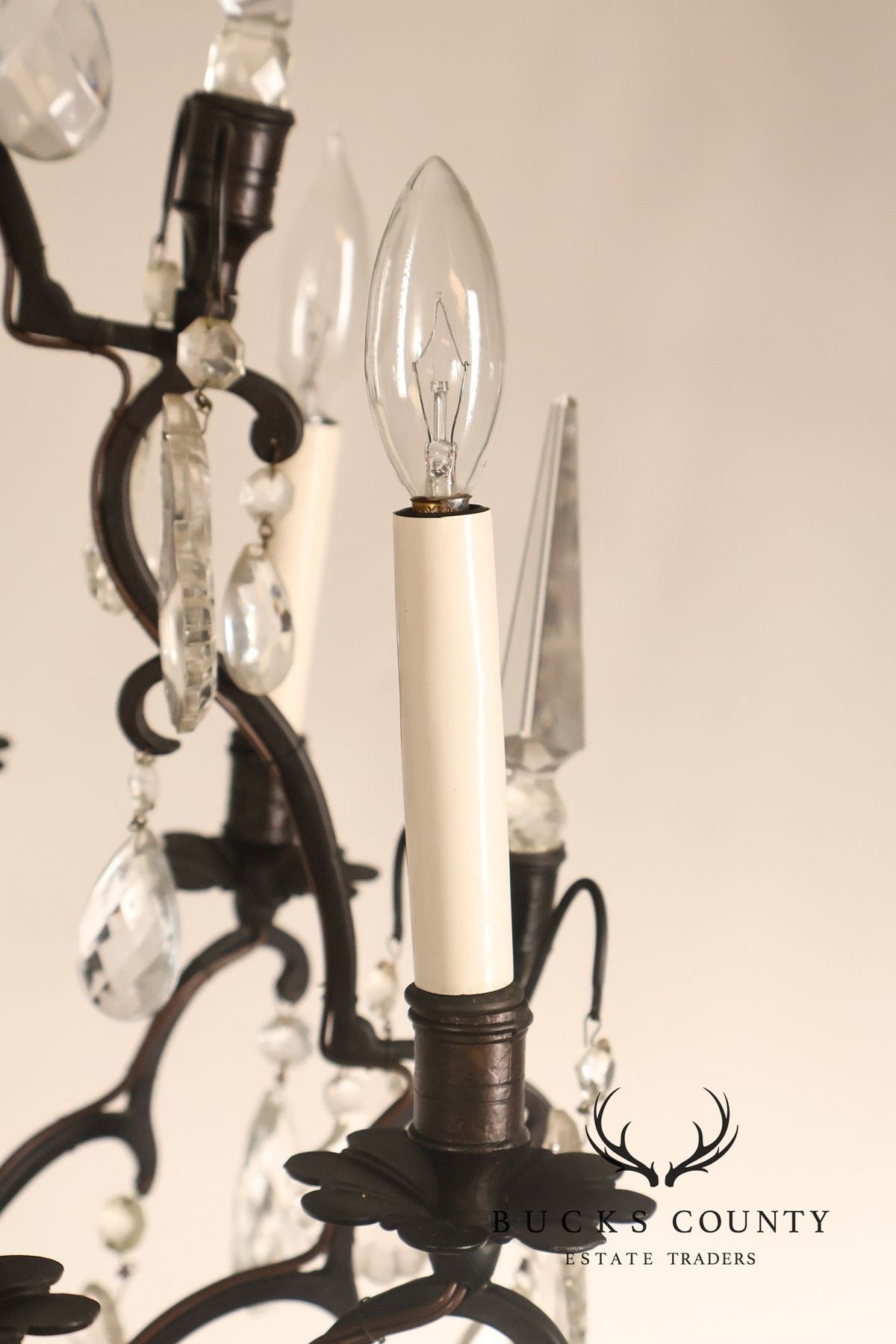 French Louis XV Style Crystal And Wrought Iron Eight Light Chandelier