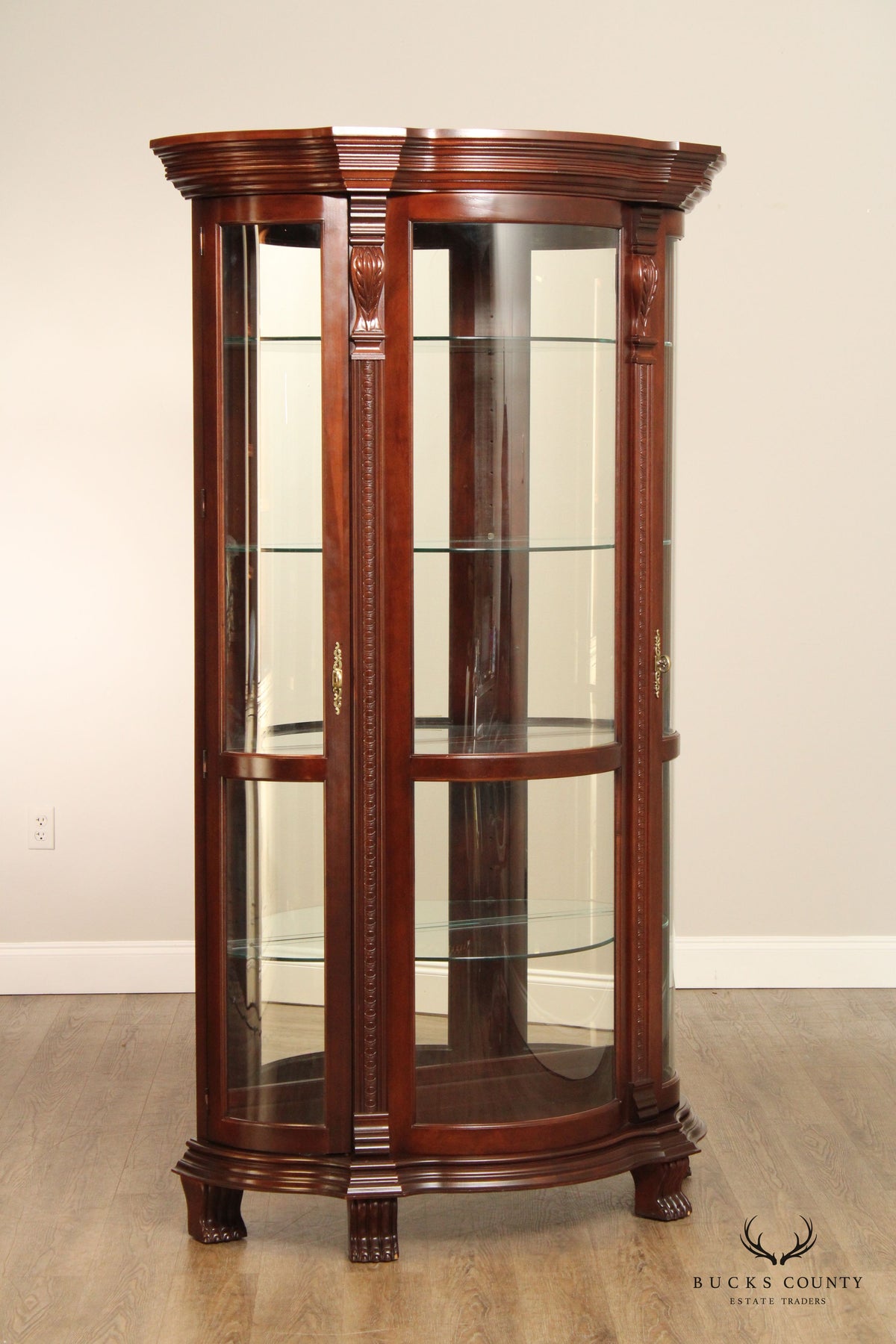 Philip Reinisch Company Bow Front Illuminated Curio Cabinet