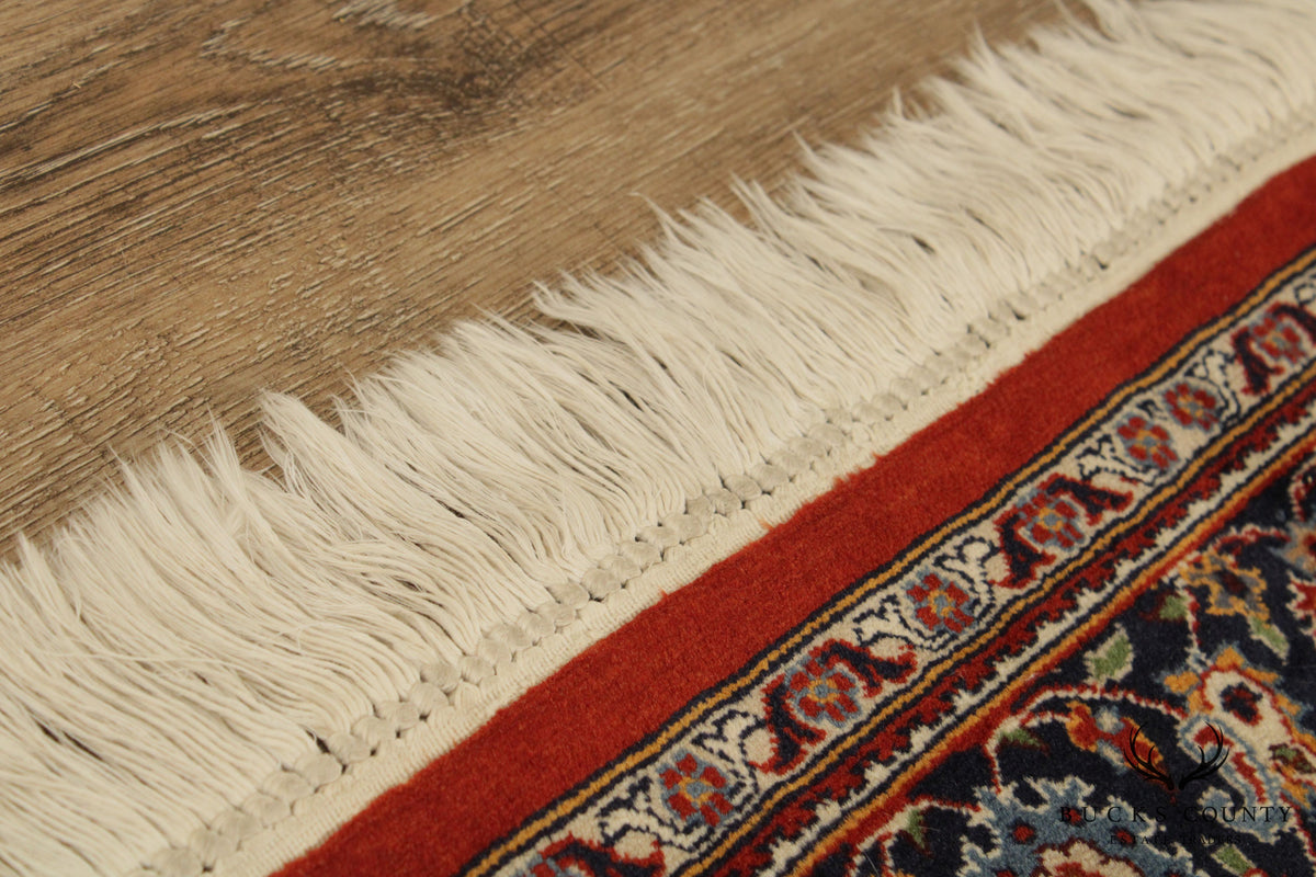 Vintage Sarouk 6'9 inch x 4'1 inch Handwoven Wool Rug