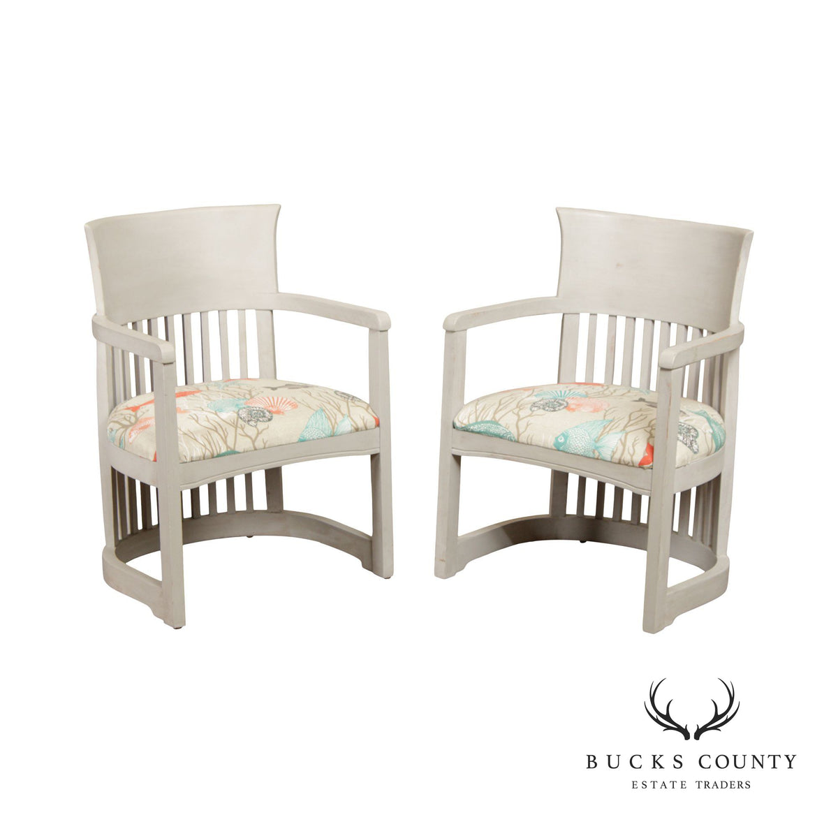 PAIR OF FRANK LLOYD WRIGHT INSPIRED BARREL CHAIRS